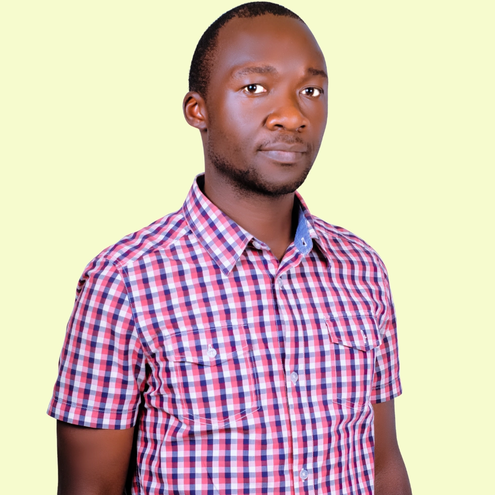 Alex Akidiva side poses in a portrait
