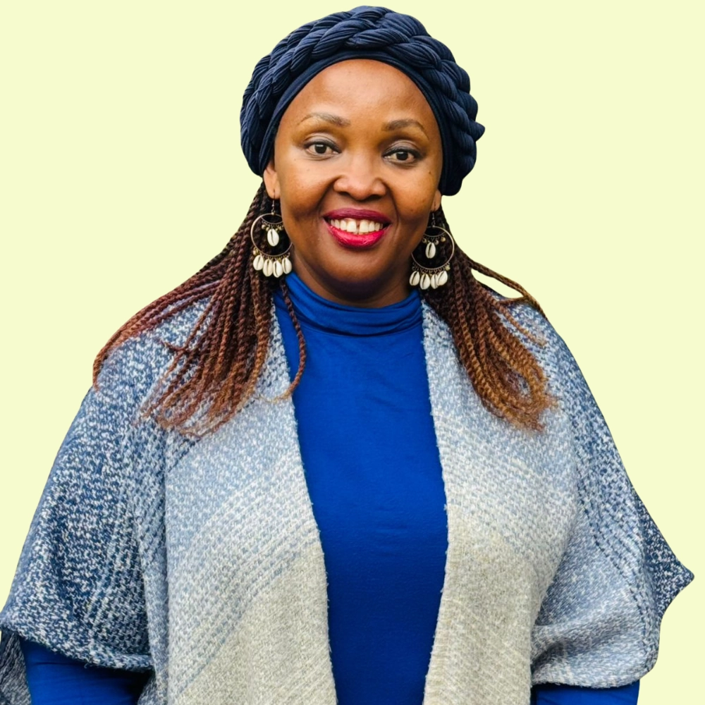 Dr. Wangui Ndungu smiles and poses for in a portrait